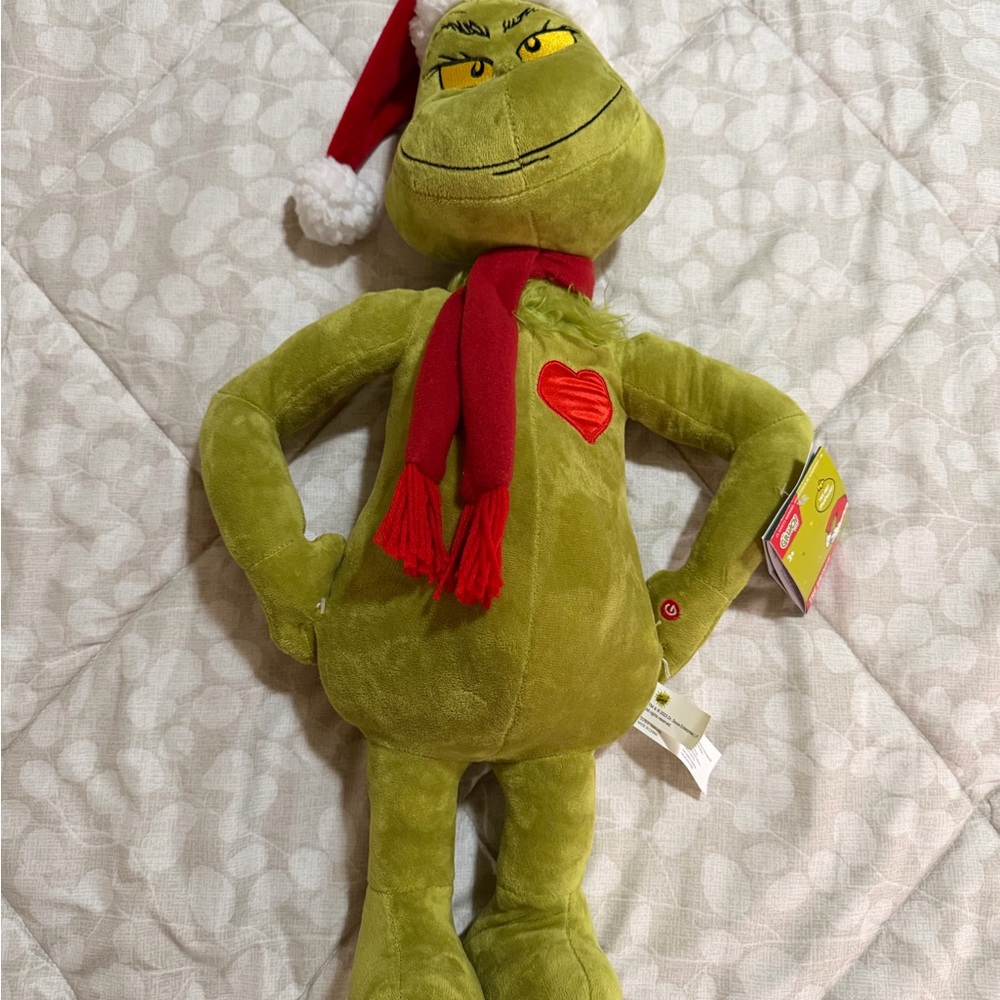 Green Grinch Plush with Red Santa Hat and Scarf